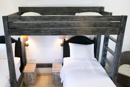 Postel nebo postele na pokoji v ubytování OK Divers Resort & Spa