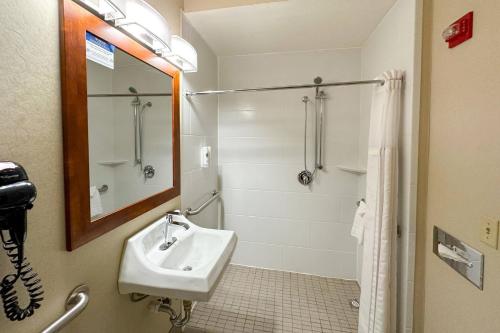a bathroom with a sink and a shower at Comfort Inn & Suites Geneva- West Chicago in Geneva