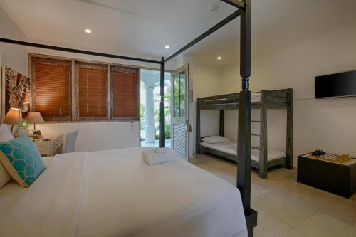 Postel nebo postele na pokoji v ubytování OK Divers Resort & Spa