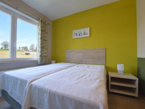 Llit o llits en una habitació de Robertville Lakeview Escape