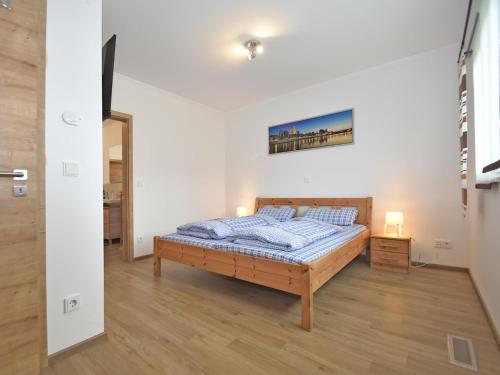 a bedroom with a bed in a room at Bodenwöhr Lakeside Gem in Bodenwöhr