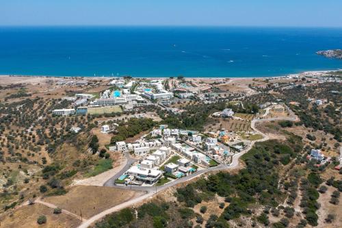 an aerial view of a resort near the ocean at Trapezia Luxury Living in Kolimbia