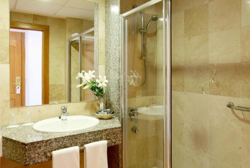 Un baño de Hotel Poseidon Playa