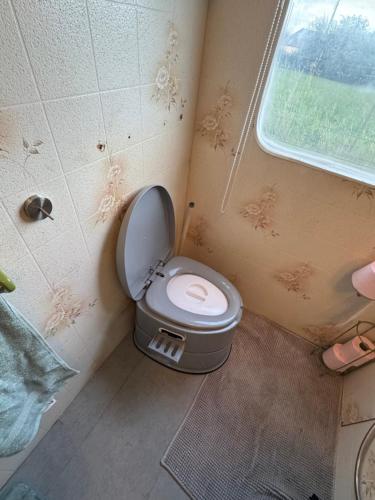 Posezení v ubytování MOBILHOME PRIVÉ avec jardin privé