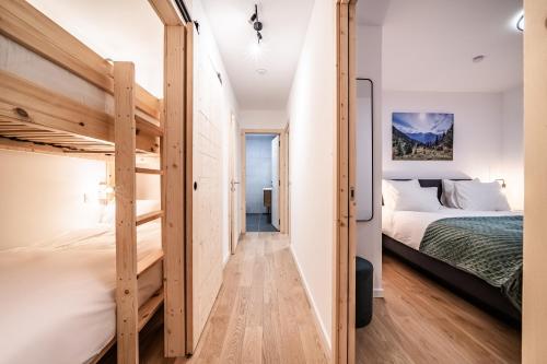 Ein Bett oder Betten in einem Zimmer der Unterkunft Apartment Osmose 002, Châtel - by EMERALD STAY