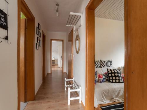 a hallway leading to a living room with a couch at Ferienwohnung, Marktleuthen in Marktleuthen