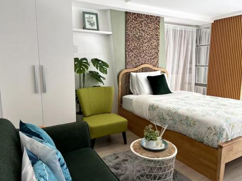 Кровать или кровати в номере Tropical Zen Modern Minimalist