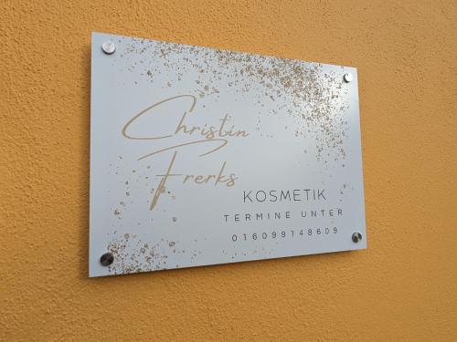 a sign on the side of a wall at Spacious appartment in Wilhelmshof near Lake in Wilhelmshof