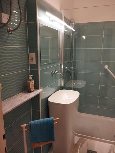 a bathroom with a sink and a shower at apartman Cedra in Izola