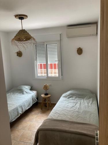 Postel nebo postele na pokoji v ubytování Casa Amis Calpe