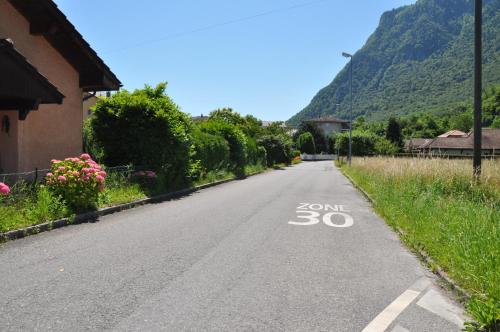 an empty road with a sign that says some at Jade B&B in Bouveret
