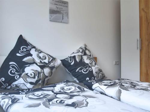 Postel nebo postele na pokoji v ubytování Ferienwohnung im Bayerischen Wald