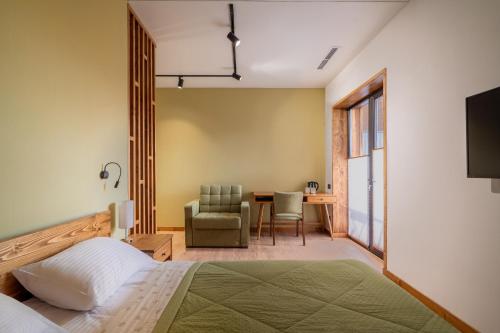 Postel nebo postele na pokoji v ubytování Aprie Boutique Hotel