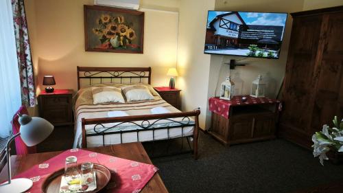 Cama o camas de una habitación en Karczma na Woli
