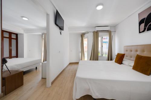 Letto o letti in una camera di Hotel Madrid