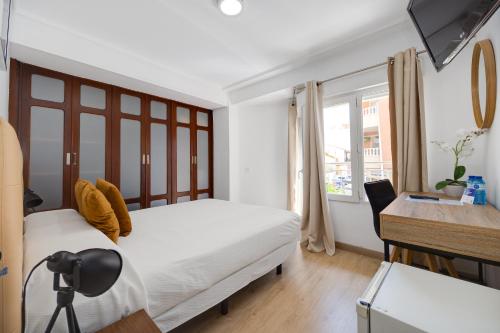 Letto o letti in una camera di Hotel Madrid