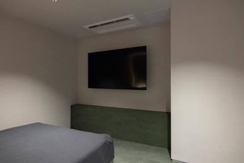 TV a/nebo společenská místnost v ubytování Aank Hotel Suwon Station