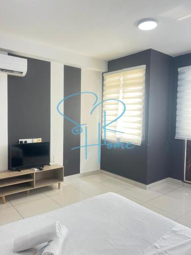 Ένα ή περισσότερα κρεβάτια σε δωμάτιο στο Residences at Daya by SR Home
