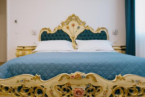 Ένα ή περισσότερα κρεβάτια σε δωμάτιο στο B&B Ca' degli Orsi