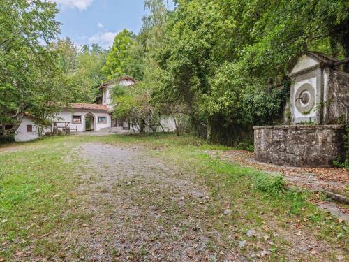an empty road in front of a house at Holiday Home with Garden and shared pool in Migliorini