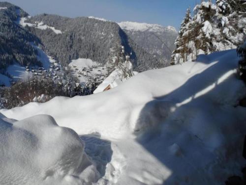 a pile of snow on top of a mountain at Graceful Chalet in Gaschurn with Sauna in Gaschurn