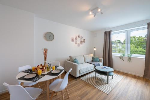 Χώρος καθιστικού στο Sailor's Cabin - Neues Apartment in Deichnähe mit Garage von STAY YOUR WAY