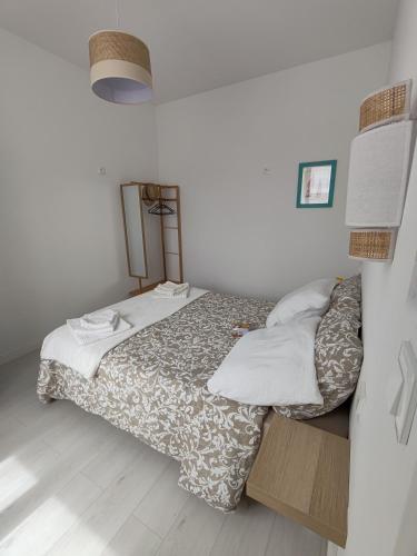 Llit o llits en una habitació de Sanouva