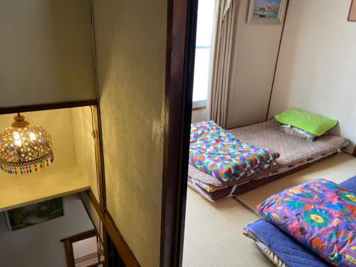 Letto o letti in una camera di AnNam Stay HOTARUGAIKE - - whole two story house rental