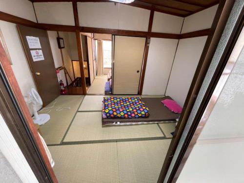 Letto o letti in una camera di AnNam Stay HOTARUGAIKE - - whole two story house rental