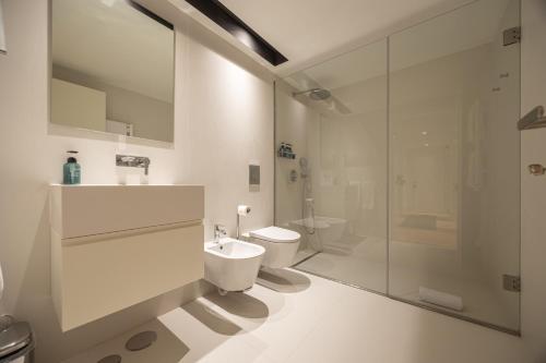 Ένα μπάνιο στο Luxurious Flat in Award-Winning Building