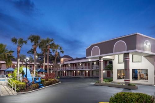 a rendering of the front of a hotel at Hotel South Tampa & Suites in Tampa