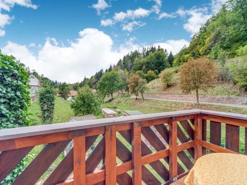 a balcony with a view of the mountains at Ferienhaus im Thüringer Wald in Langenbach