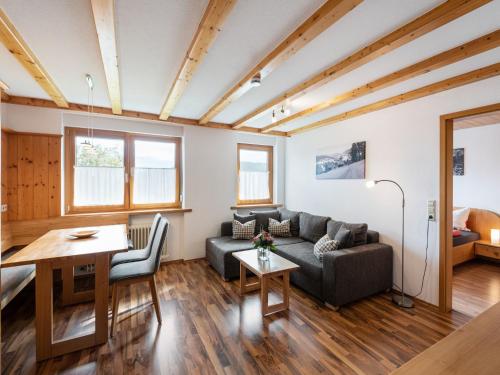 a living room with a couch and a table at Ferienwohnung, Bernau in Bernau im Schwarzwald