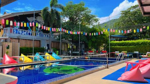 a swimming pool with a water park with a playground at WET Pool Party Haad Rin in Haad Rin