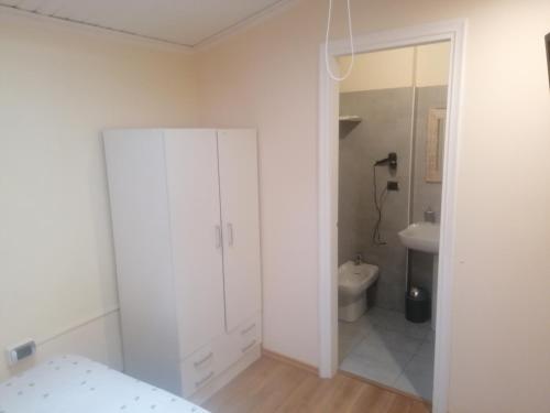 Koupelna v ubytování Hotel Lonatino