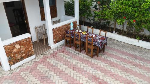 Патио или другая зона на открытом воздухе в Vyogo Blue Villa Jambiani