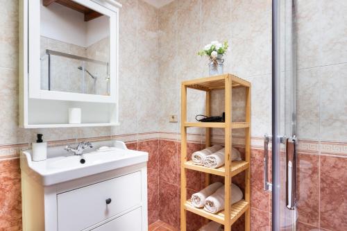 a bathroom with a sink and a shower at OkStay - Casa Canaria en El Sauzal in Tacoronte