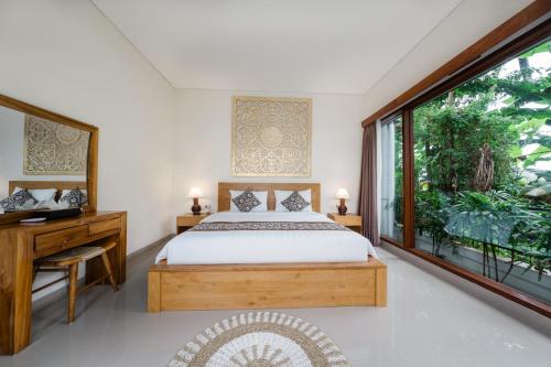 Ένα ή περισσότερα κρεβάτια σε δωμάτιο στο Villa Guru Peaceful 2BR Pool Retreat