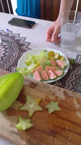 a plate of food with stars on a table at Suriya Homestay in Badalgama