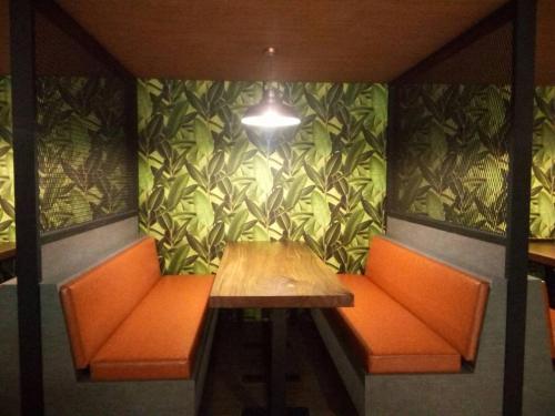 Posezení v ubytování Herma Hotel