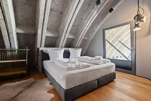 Ένα ή περισσότερα κρεβάτια σε δωμάτιο στο Shelterloft-Airpark