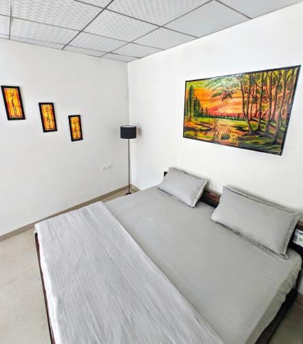 Ένα ή περισσότερα κρεβάτια σε δωμάτιο στο Home like Stay