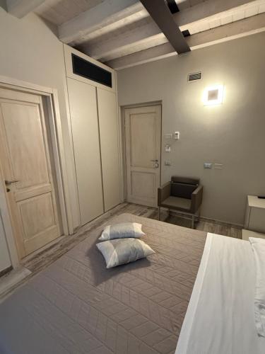 Katil atau katil-katil dalam bilik di Hotel La Valle