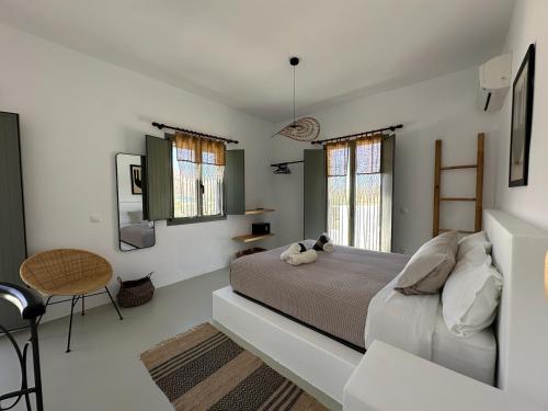 Postel nebo postele na pokoji v ubytování Ammos Andros Accommodation
