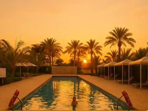 Πισίνα στο ή κοντά στο Sunny Cairo City Center l Serviced l Golf l Pool l Gym l 5