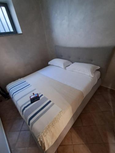 Una cama o camas en una habitación de Albero di Giada