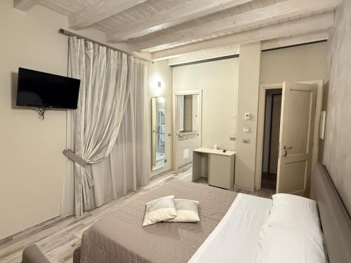 Katil atau katil-katil dalam bilik di Hotel La Valle