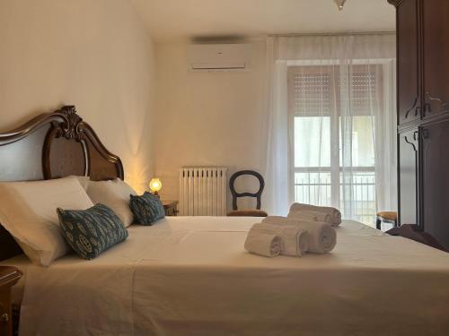 Un pat sau paturi într-o cameră la Dimora Peppino