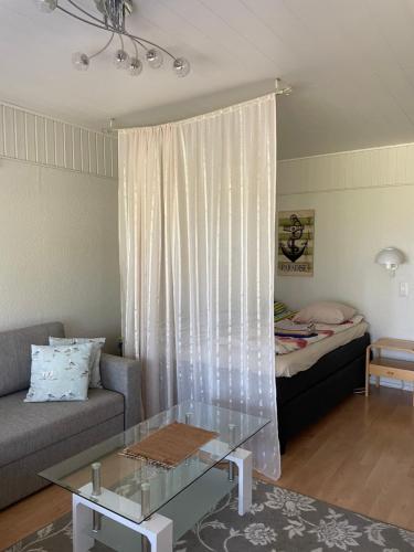 Postel nebo postele na pokoji v ubytování Joutiaisentie H 44 Sunset apartment