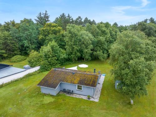 an overhead view of a house with a solar roof at Cozy Holiday Home 350 Meters From The Water In Amtoft in Vesløs